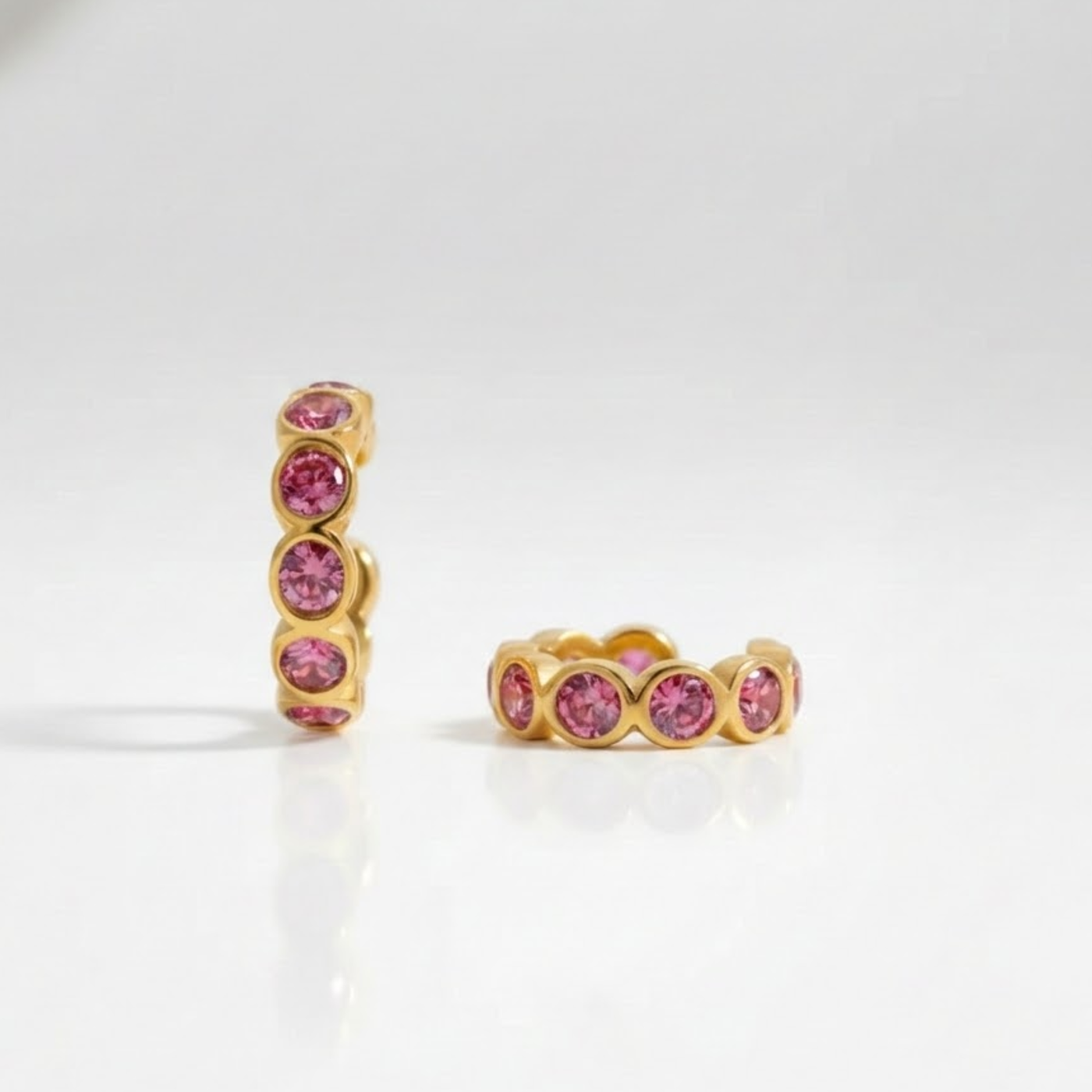 Serene Ear Cuff Pink in 18K gold plating with vibrant pink stones for everyday and festive styling.