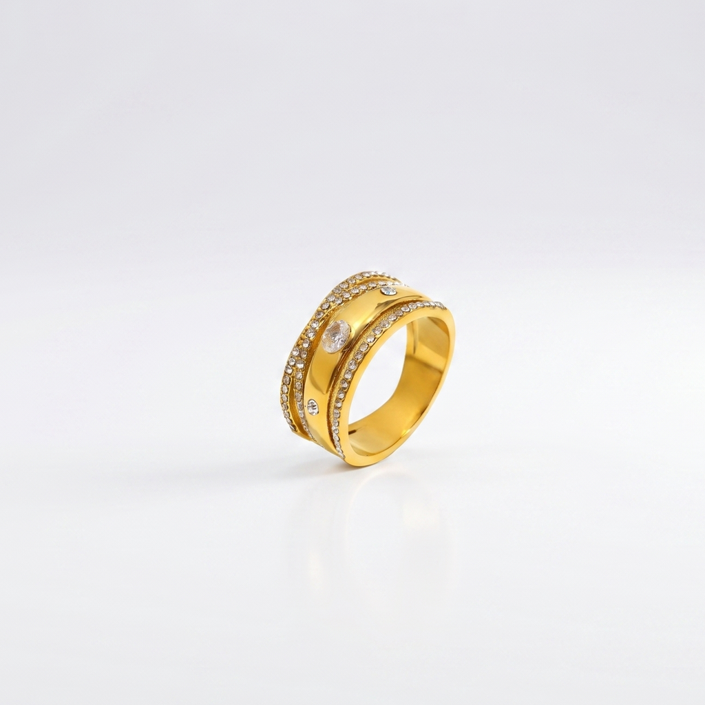 Bling It Ring product flatlay showing the 18K gold-plated layered design with clear stones.