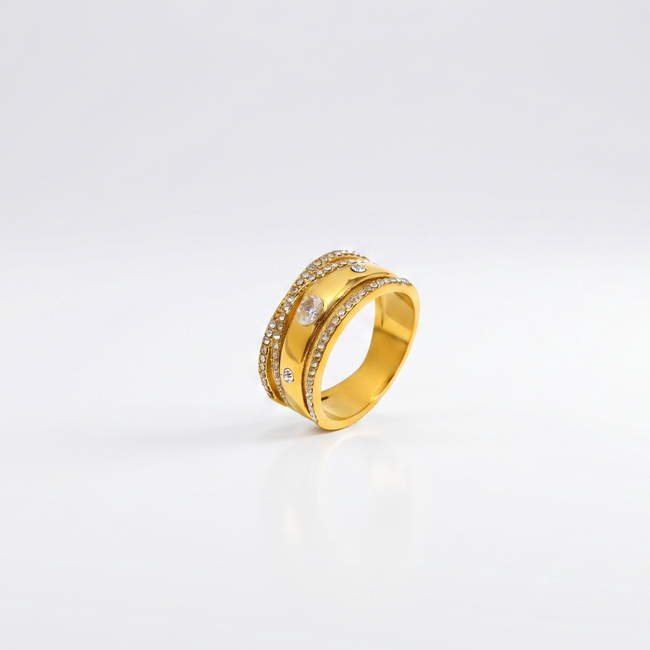 Bling It Ring product flatlay showing the 18K gold-plated layered design with clear stones.