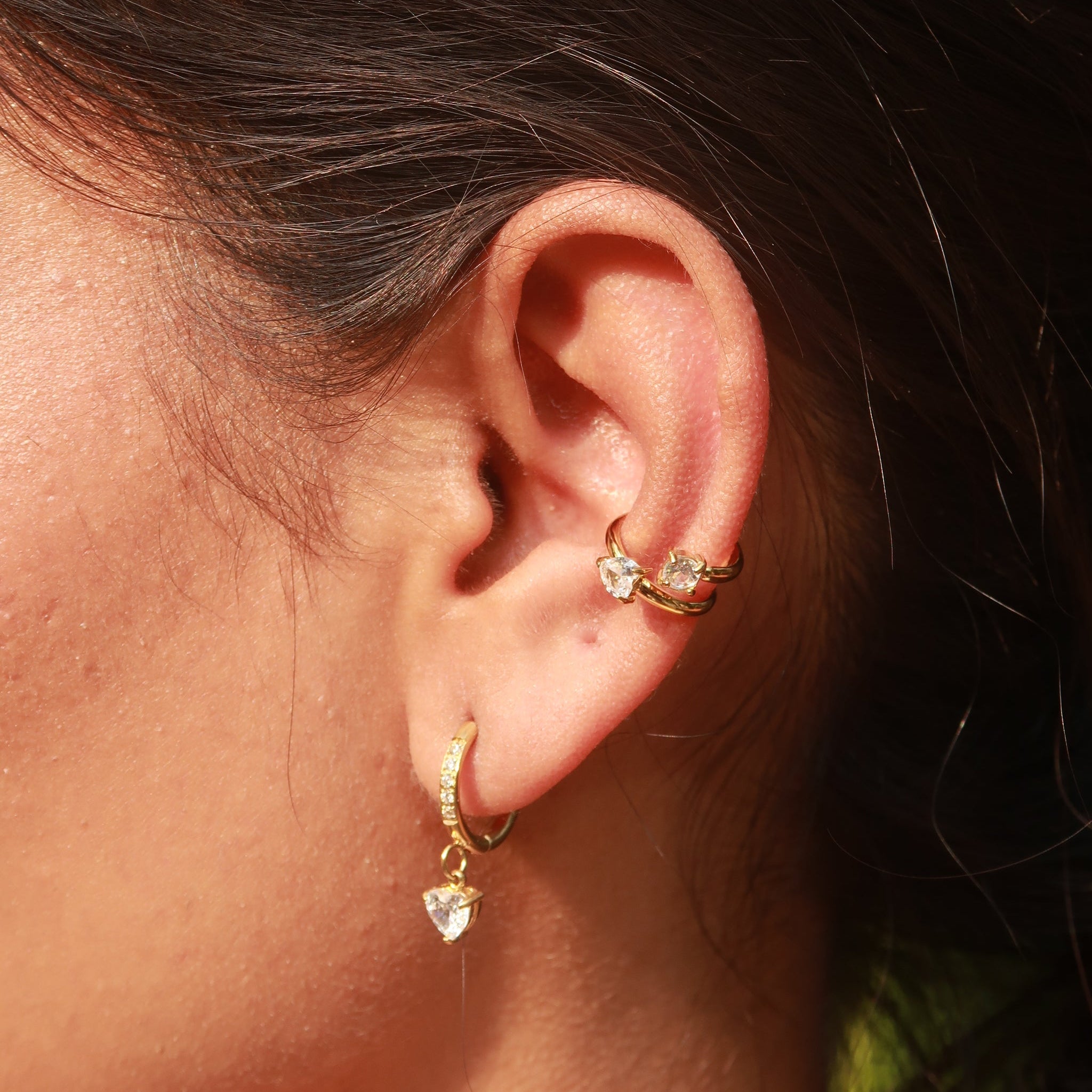 Cupid's Whisper earrings on model ear – gold-plated heart drop earrings India