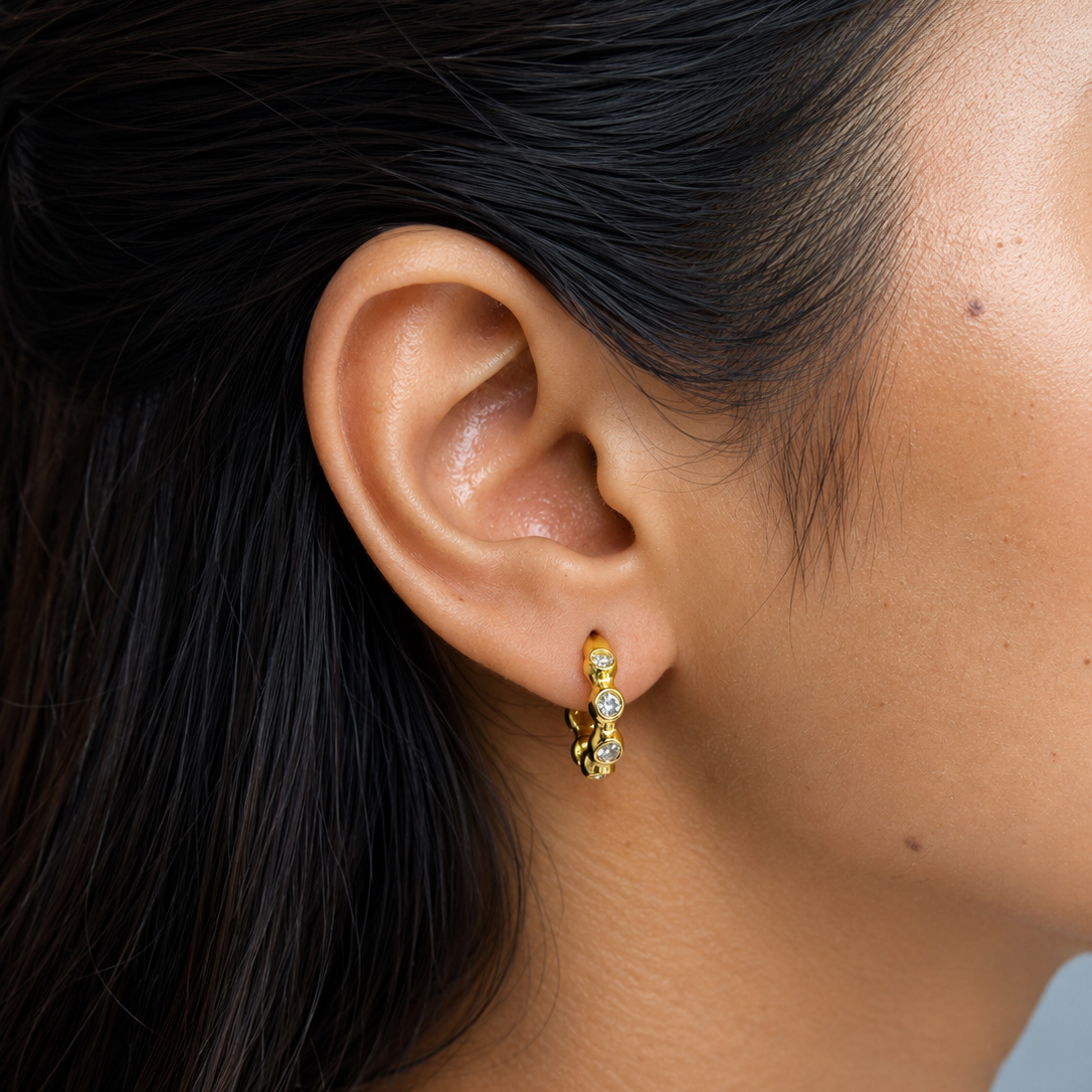 Eden Hoops styled to showcase an effortlessly chic fit, highlighting the elegant statement and durable gold finish popular in India.