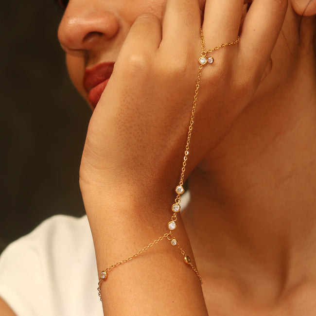 Elina hand chain flat lay – gold-plated hand chain jewellery buy online India