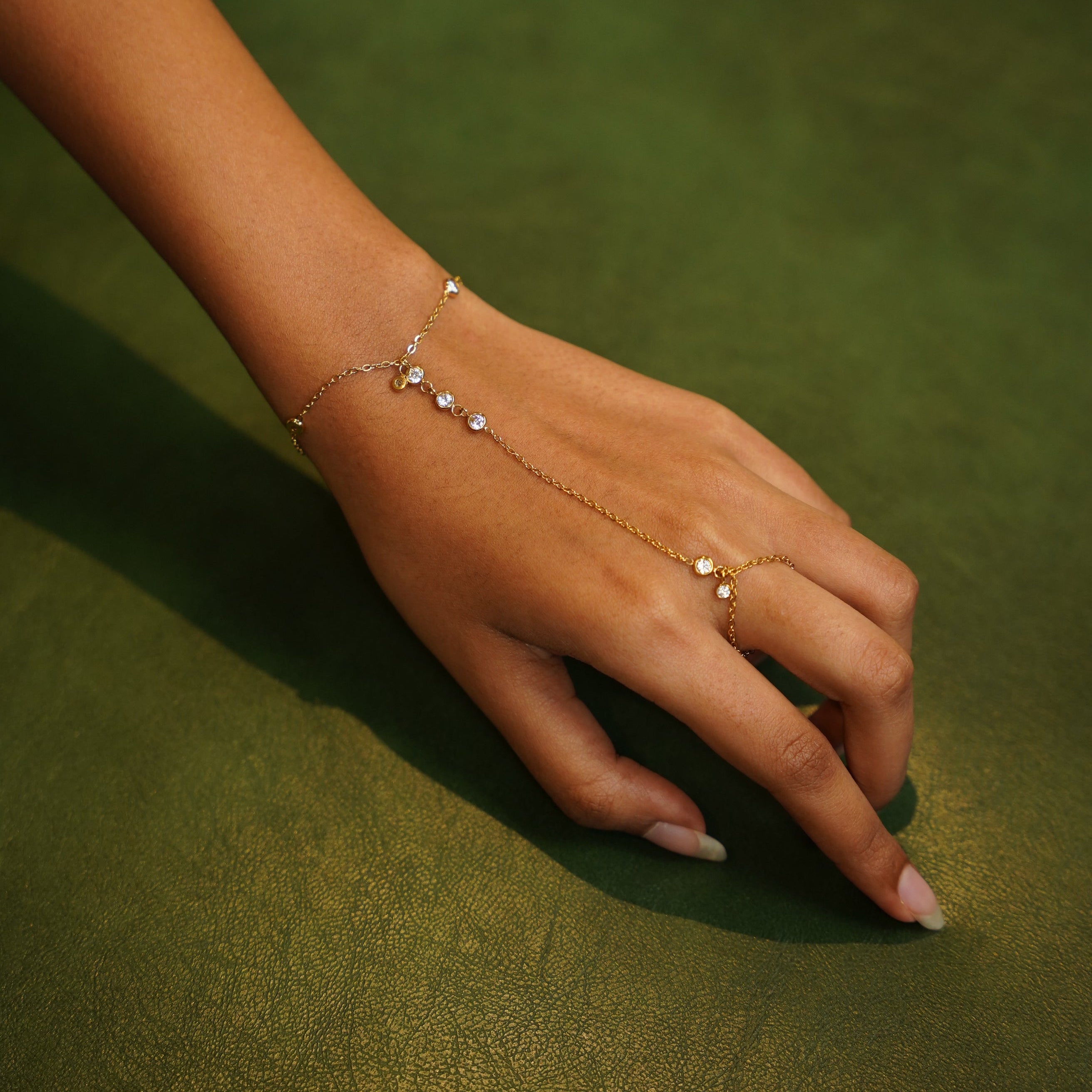 Elina hand chain model wearing – bestselling gold hand chain bracelet India
