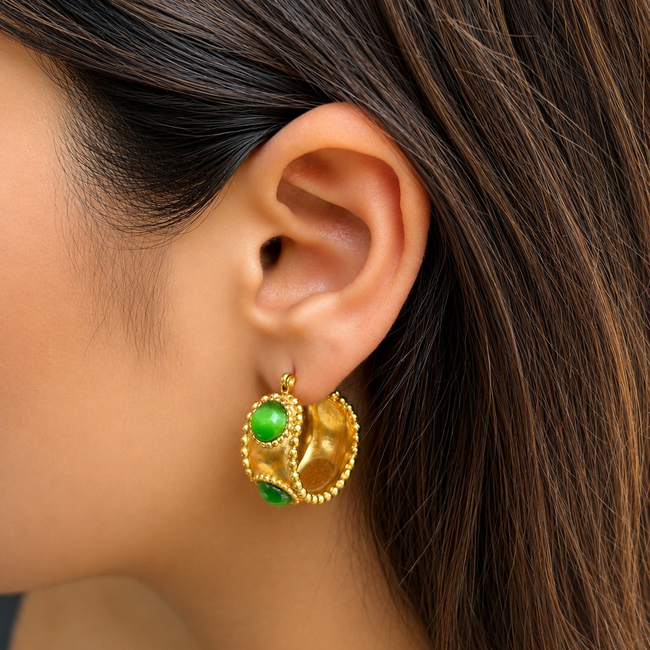 Emerald Studded Hoops styled to showcase a chic elevated look and the anti-tarnish durability popular in India.