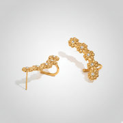 Floral Cascade Earrings revealing the durable anti-tarnish gold hook backing and graceful ear crawler silhouette designed for an elegant statement look in India.