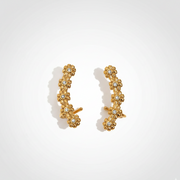 Floral Cascade Earrings displaying a waterproof 18K gold-plated ear climber design with crystal-studded flowers crafted for elevated everyday wear in India.