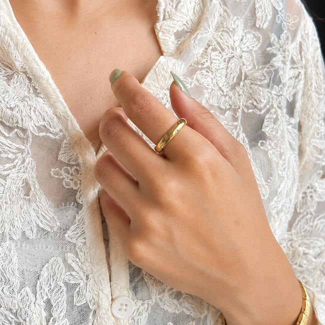 Golden Loop Ring styled on hand with elegant gold-plated finish for everyday wear.