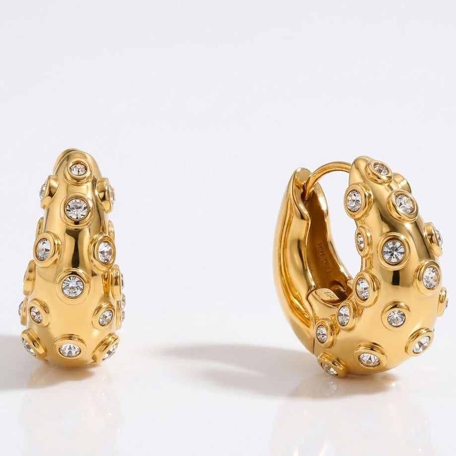 Ira Studded Hoops revealing the secure hinge clasp and waterproof, anti-tarnish gold finish designed for daily wear in India.