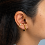 It Girl Earrings worn in an elevated stack with a studded cuff, displaying the waterproof gold finish and unique statement style perfect for daily wear in India.