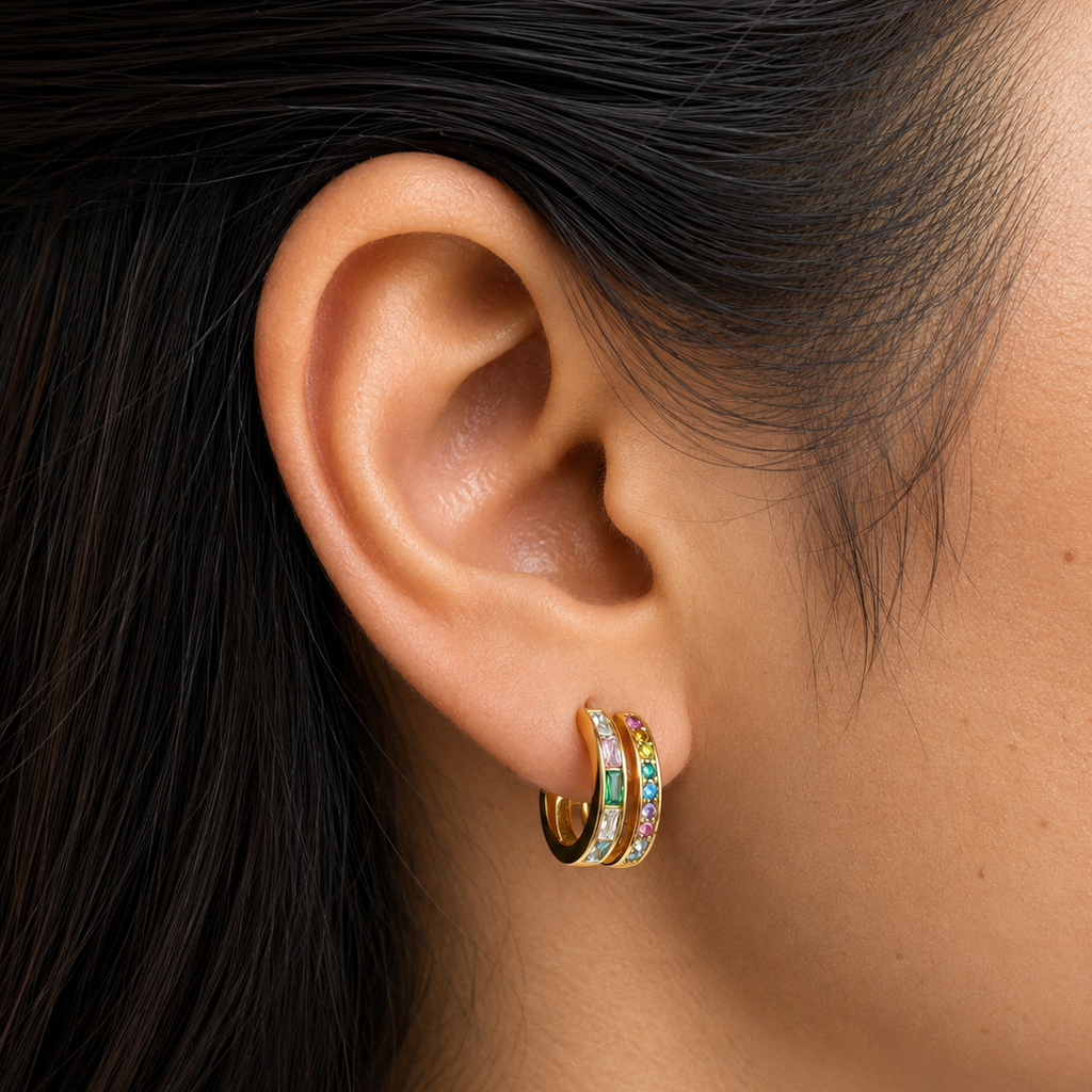 Luma Sparkle Hoops featuring a waterproof split-hoop illusion with vibrant multi-colored crystals.