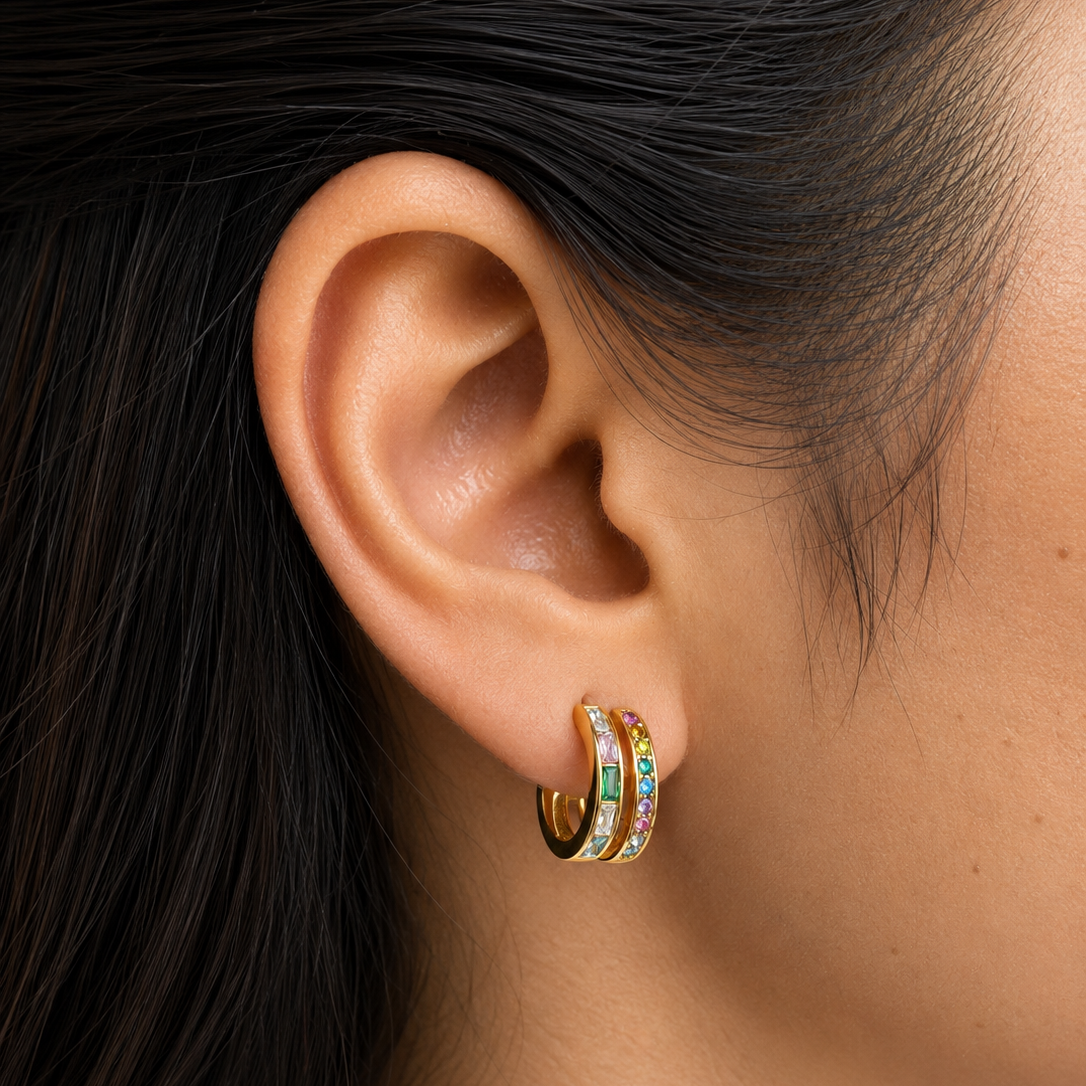 Luma Sparkle Hoops featuring a waterproof split-hoop illusion with vibrant multi-colored crystals.