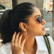 Opal Glow Ring worn as part of a chic jewelry set by a woman outdoors, capturing a vibrant lifestyle look in India.
