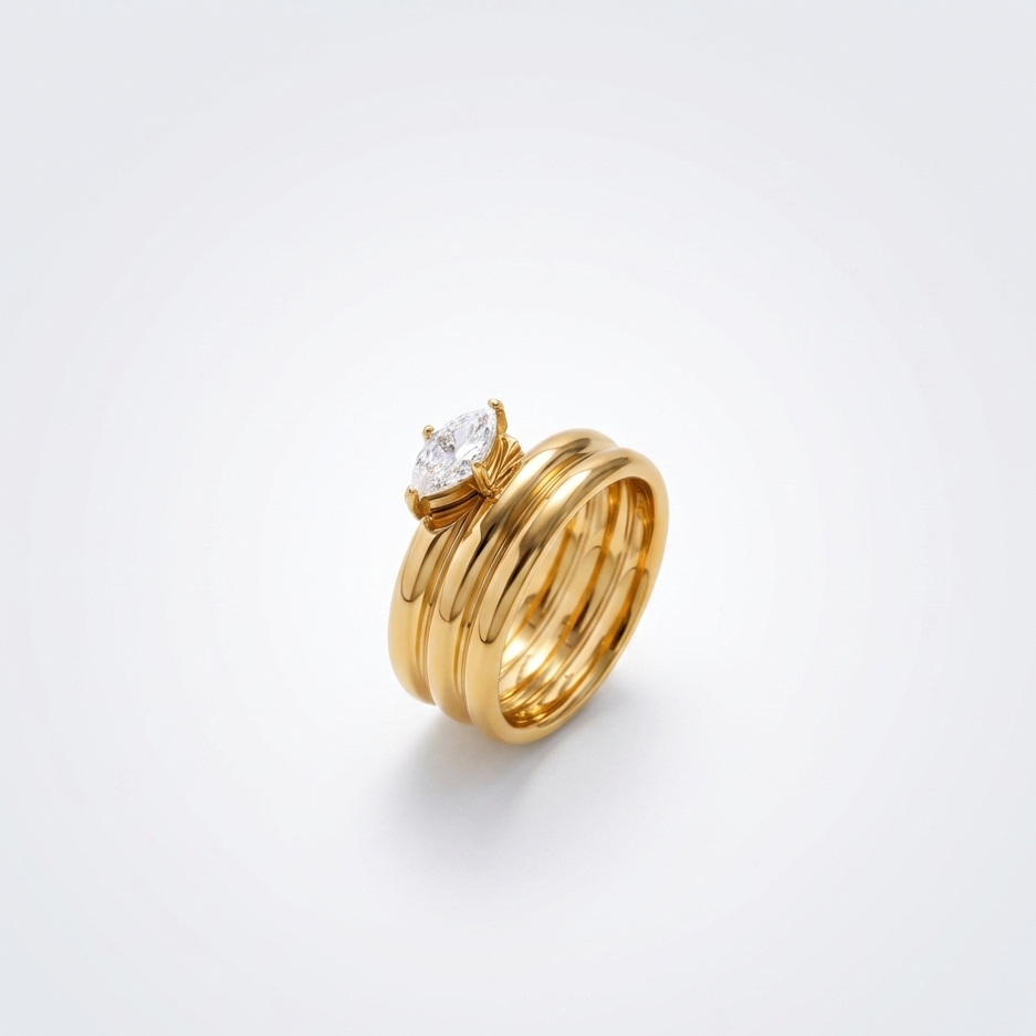 Opal Glow Ring in an angled close-up, highlighting the 18K gold-plated multi-band design and central marquise-cut stone.