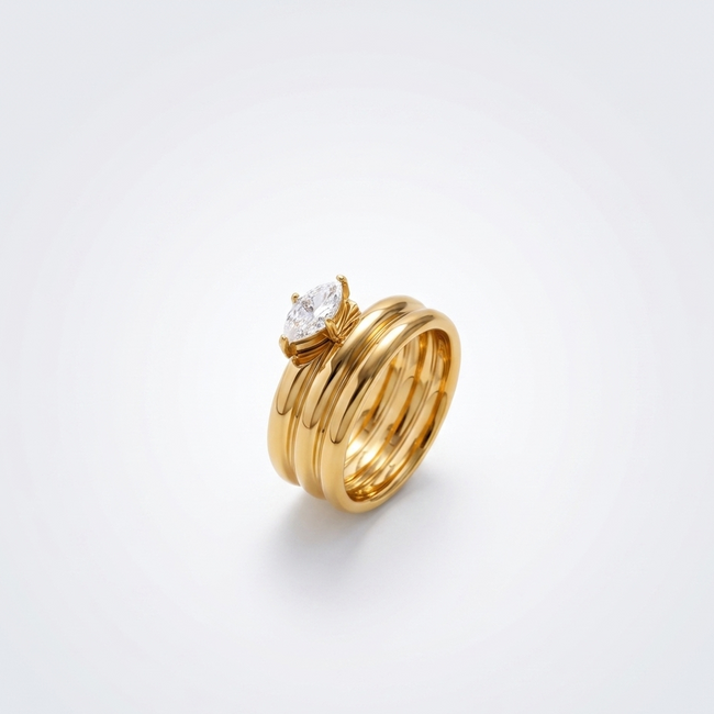 Opal Glow Ring in an angled close-up, highlighting the 18K gold-plated multi-band design and central marquise-cut stone.