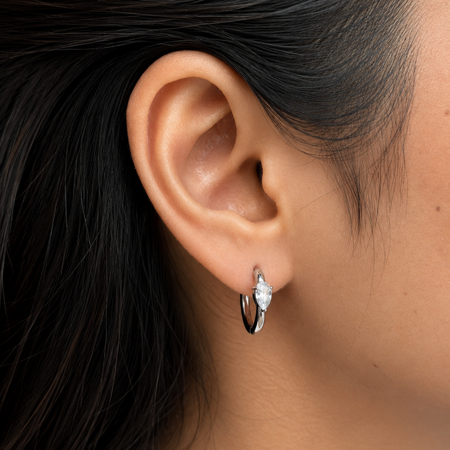 Opal Hoops styled on a model to showcase the soft chic silver fit and elegant everyday aesthetic popular in India.