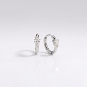 Opal Hoops displaying a waterproof silver finish with a luminous teardrop stone designed for everyday wear in India.