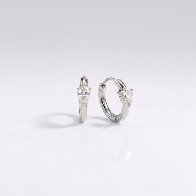 Opal Hoops displaying a waterproof silver finish with a luminous teardrop stone designed for everyday wear in India.