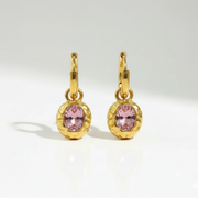 Pink Gem Hoops revealing the durable gold construction and textured detail surrounding a delicate pink gem designed for everyday styling in India.