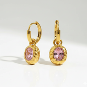 Pink Gem Hoops displaying a waterproof 18K gold-plated hammered setting with a vibrant pink stone crafted for all-day wear in India.