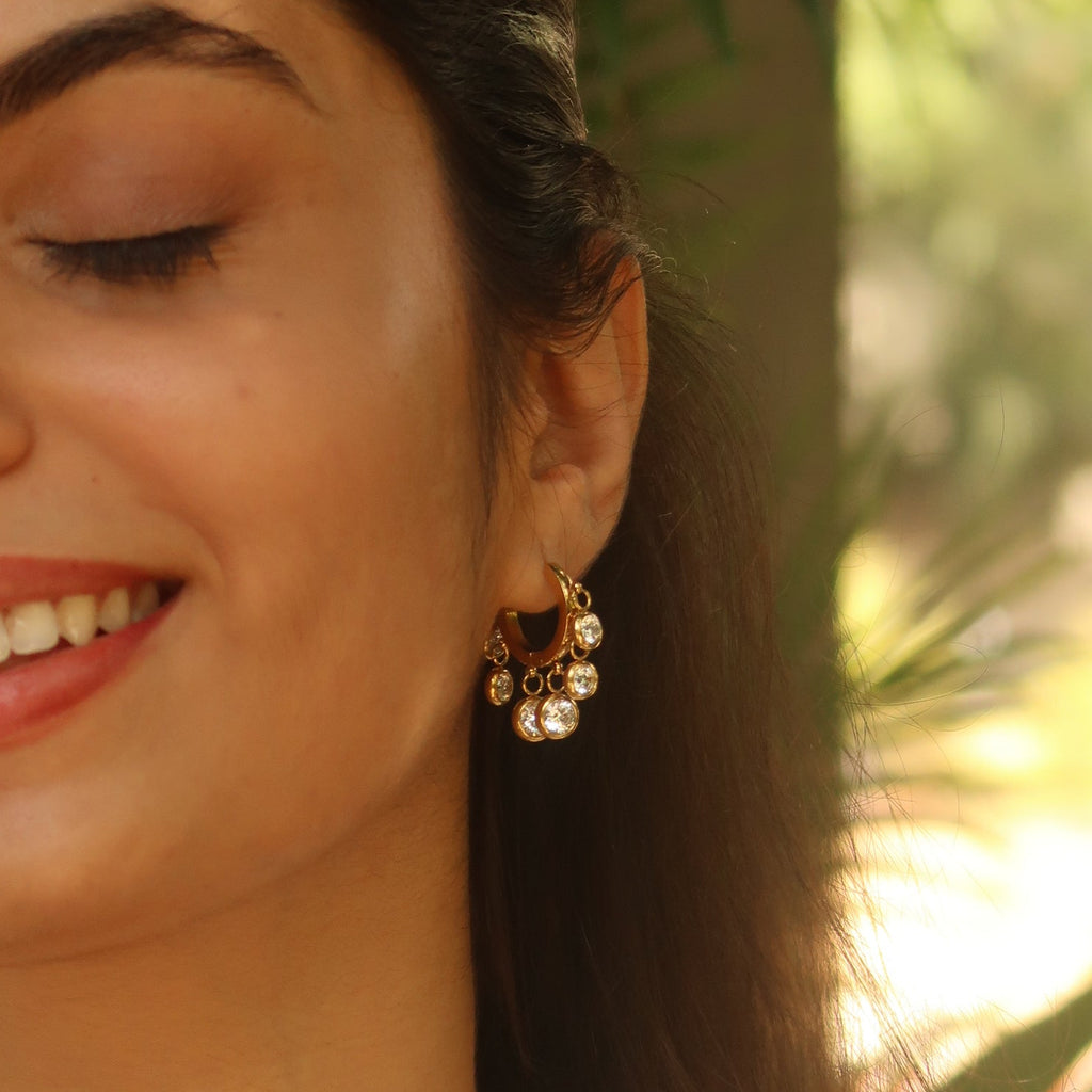 White stone gold huggie earrings close-up – anti-tarnish jewellery for women India
