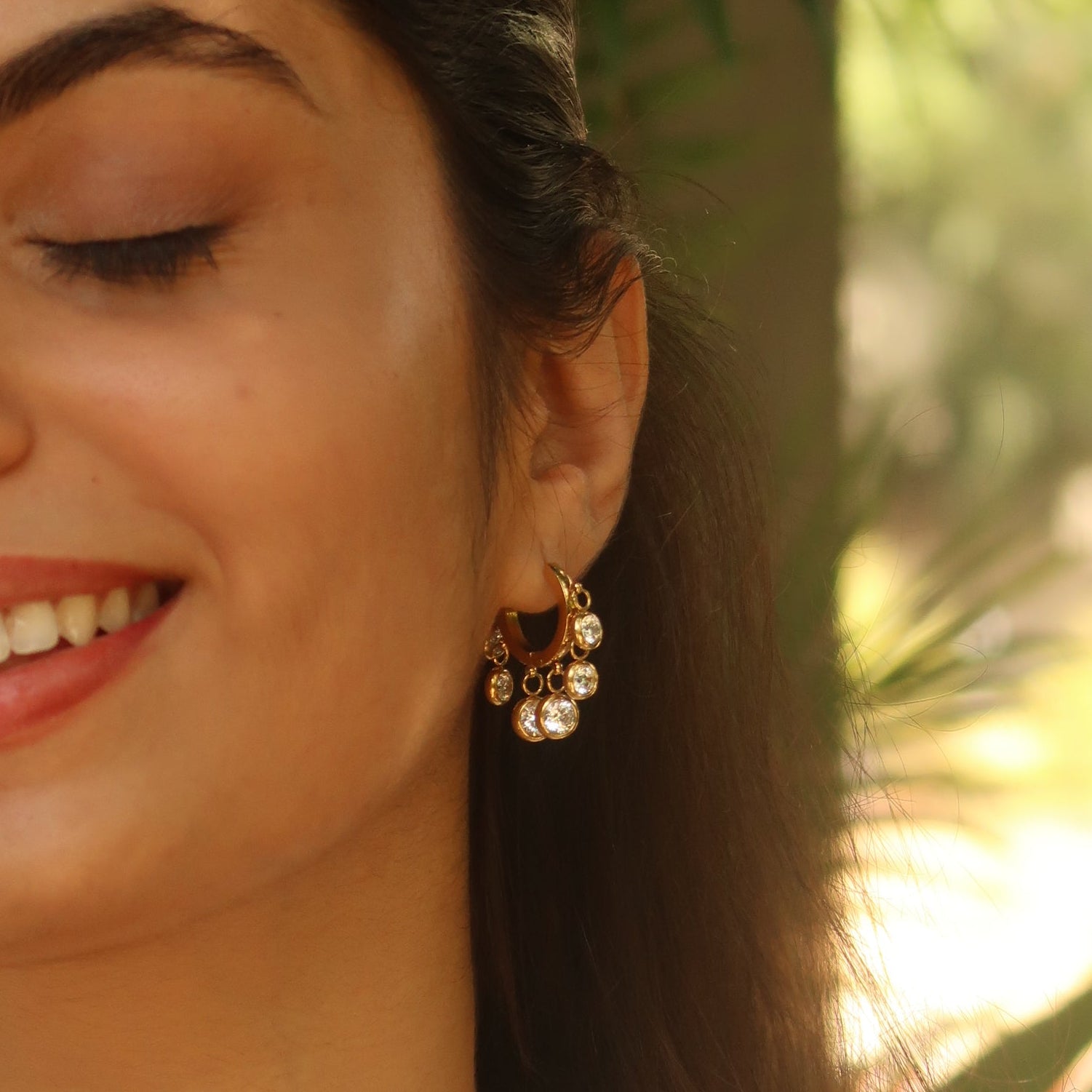 White stone gold huggie earrings close-up – anti-tarnish jewellery for women India
