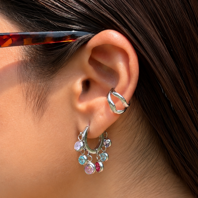 Royal Exotic Multicolour Huggies styled with a silver ear cuff for a festive layered jewellery look