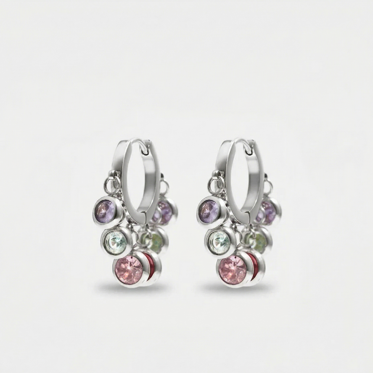 Royal Exotic Multicolour Huggies adding playful colour and sparkle to a modern ear stack