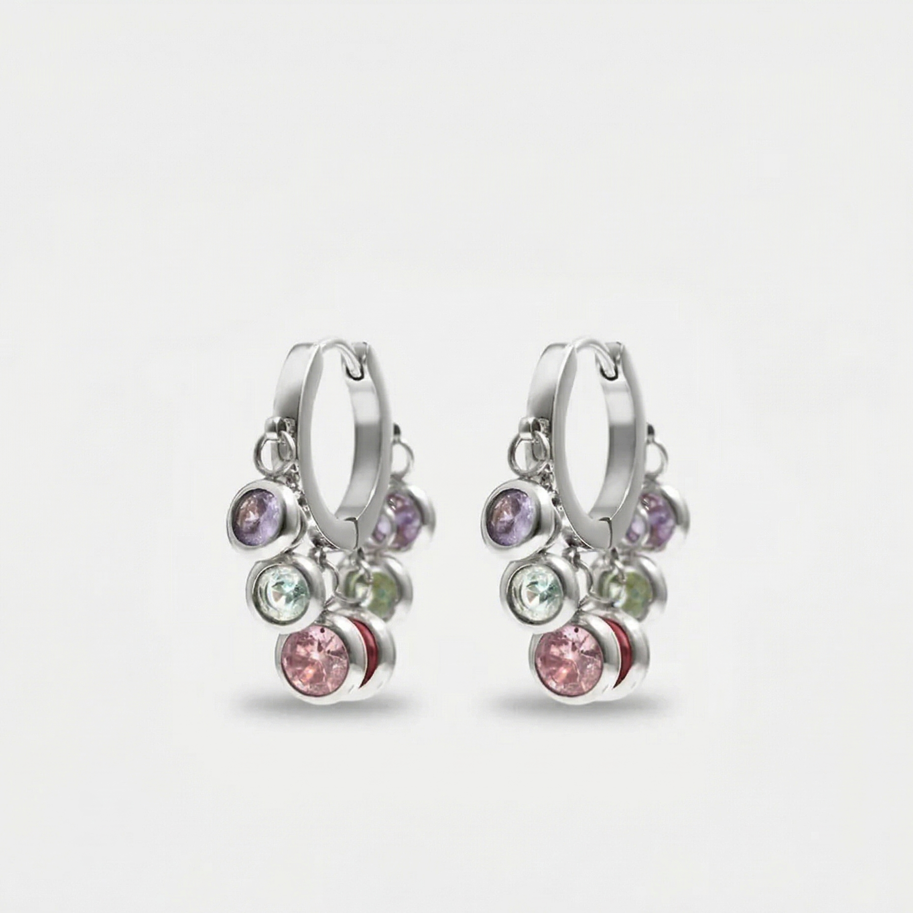 Royal Exotic Multicolour Huggies adding playful colour and sparkle to a modern ear stack