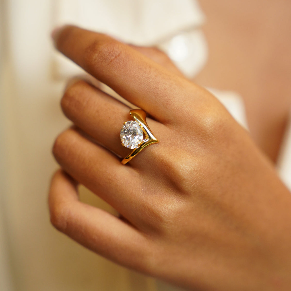 Minimalist sculpted ring worn by Indian woman - everyday gold ring online India