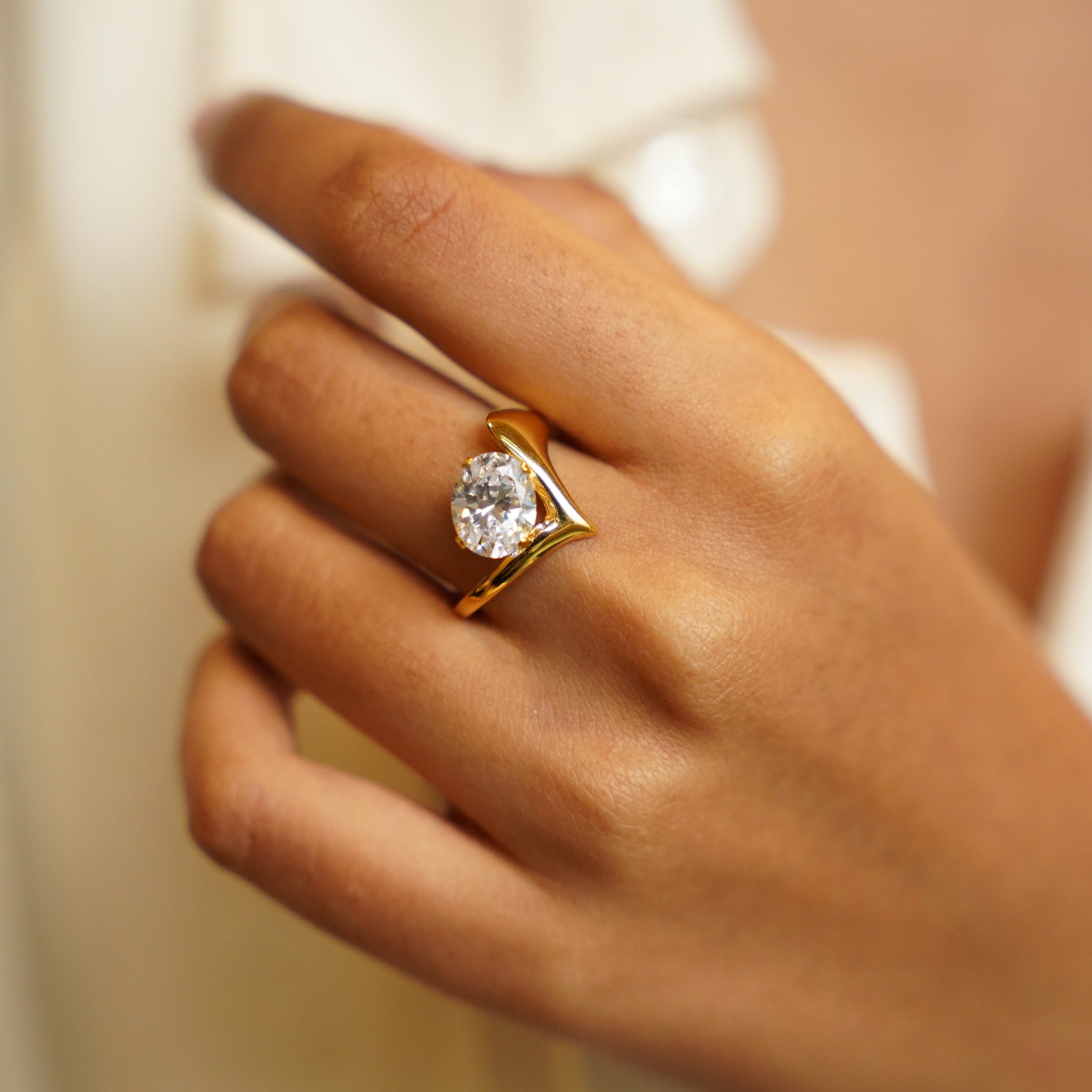 Minimalist sculpted ring worn by Indian woman - everyday gold ring online India