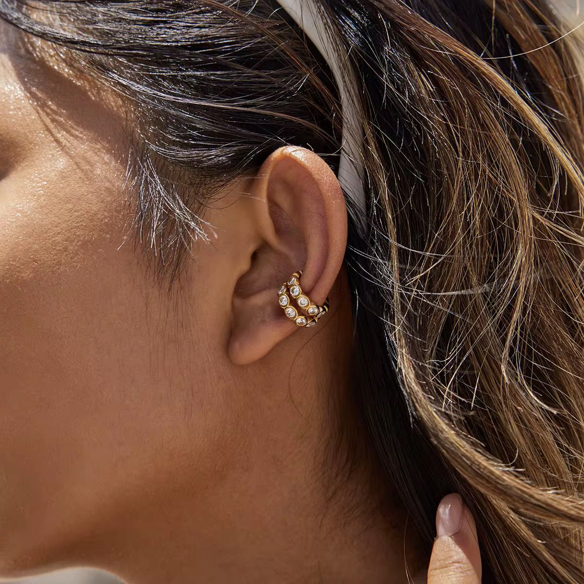 Serene ear cuff – model wearing gold-plated ear cuff on ear lifestyle India
