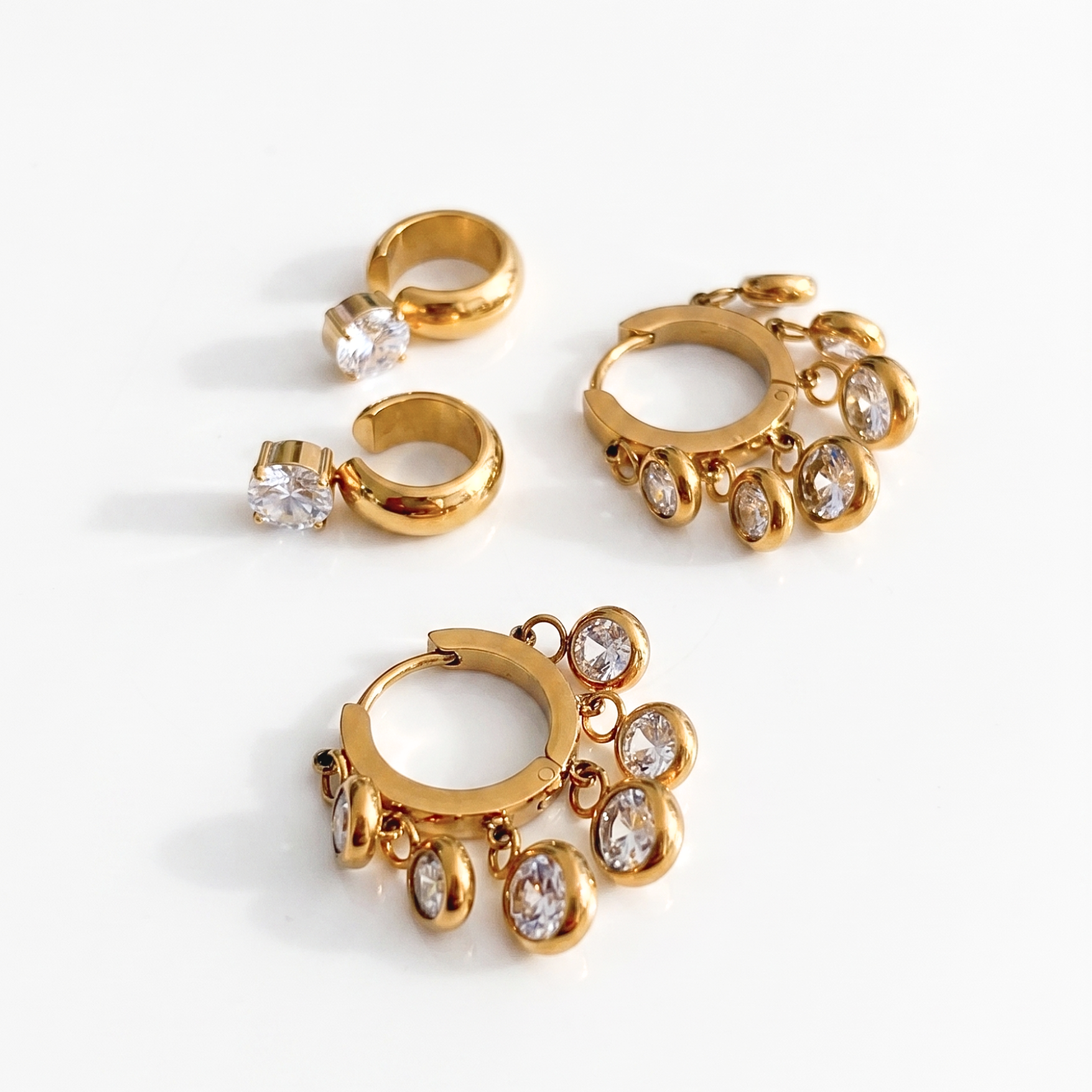 The Daily Stack pairing the Zara Cuff and Royal Exotic Huggies for a festive party look.