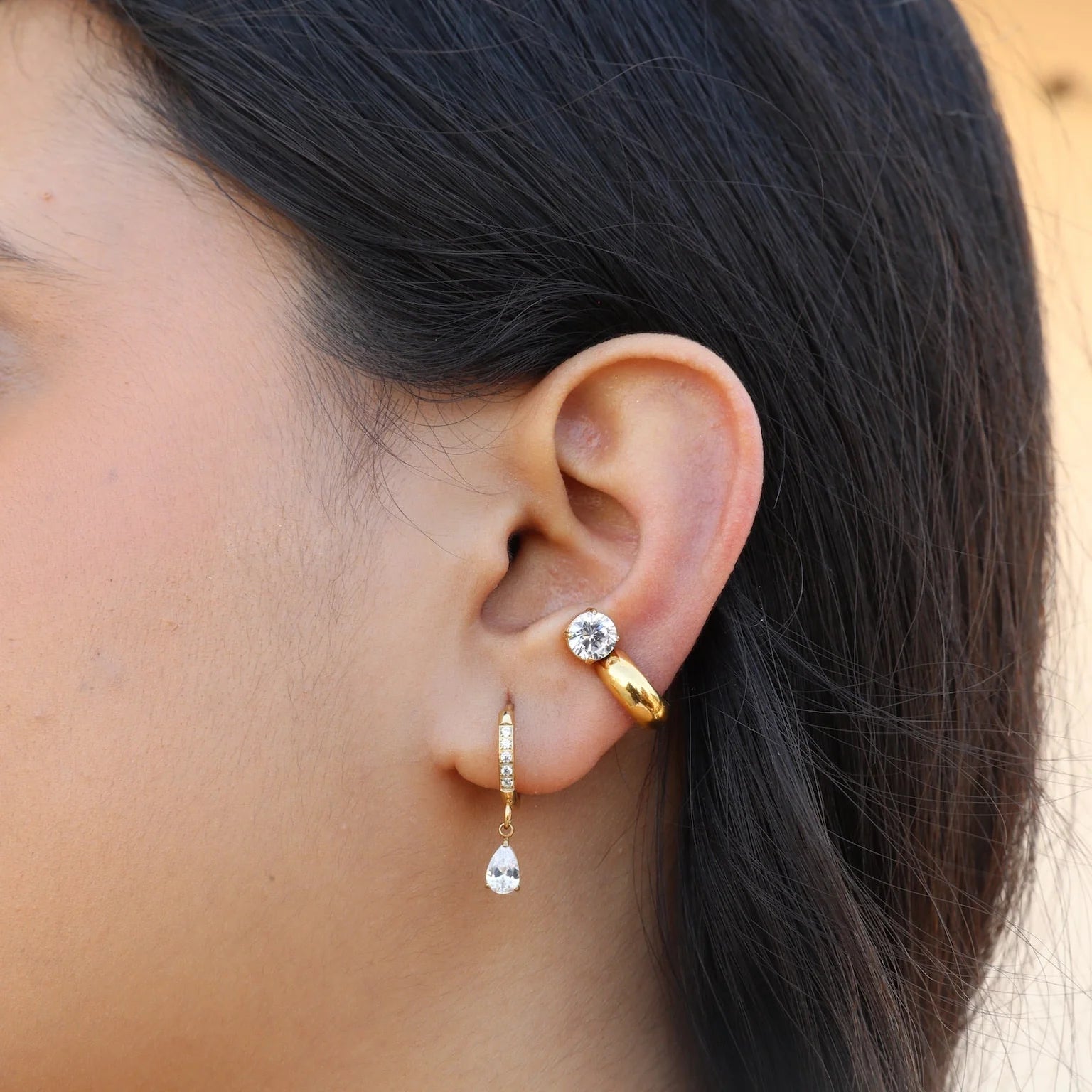 The Daily Stack highlighting a festive Zara Cuff paired with a delicate teardrop huggie.
