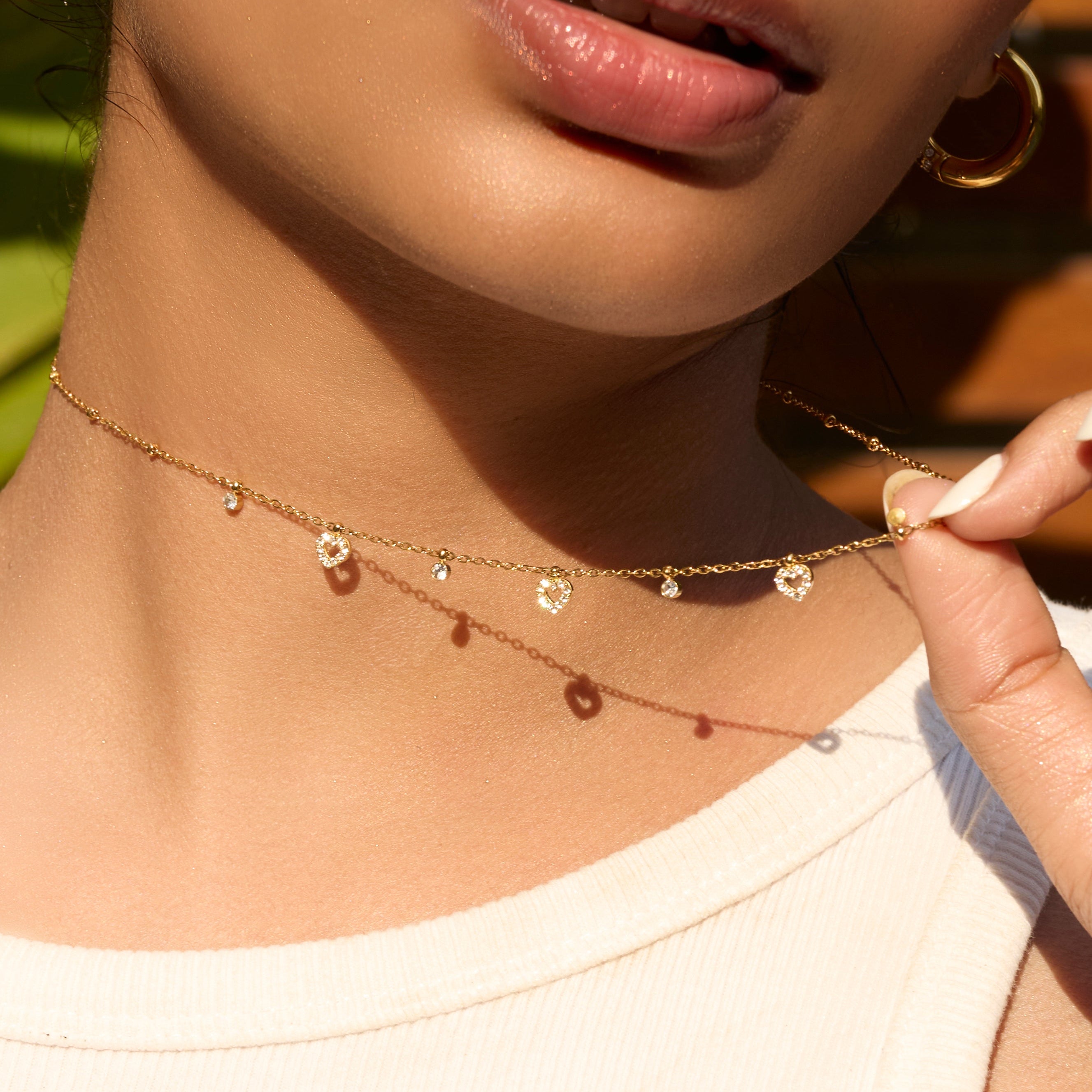 Tiny hearts jewellery combo styled for date night - dainty gold heart jewellery India