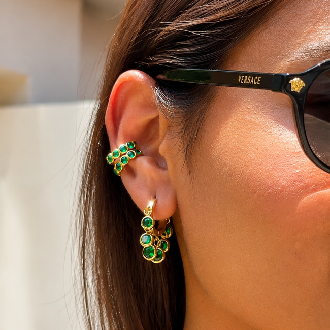 Eternal Emeralds Combo creating a modern layered ear stack with vibrant emerald stones and timeless elegance