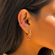 Tropical Pop Duo pink ear cuff and Huggies earrings styled for festive and party wear.